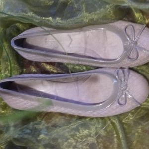 Size 9 women's slip-ons taupe in color soft material cushion base patent trim